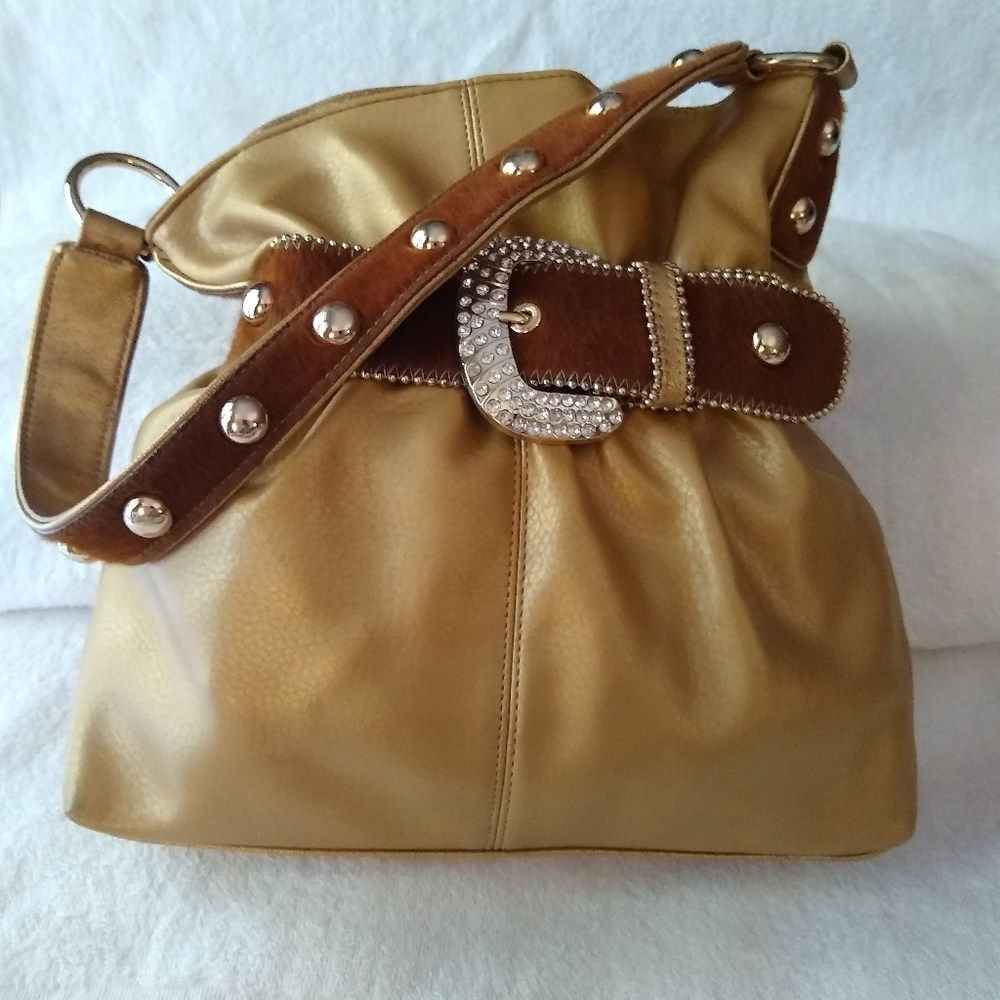 Kathy Van Zeeland bucket shoulder bag.